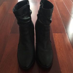 Black leather heeled boots